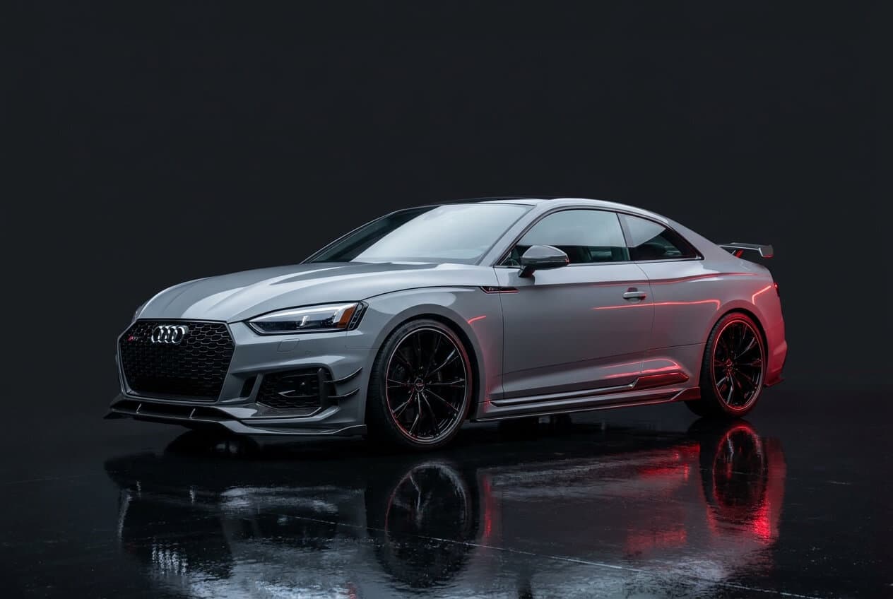 Photoreal render of a Nardo Gray Audi RS5 with a full carbon-fiber aero kit.