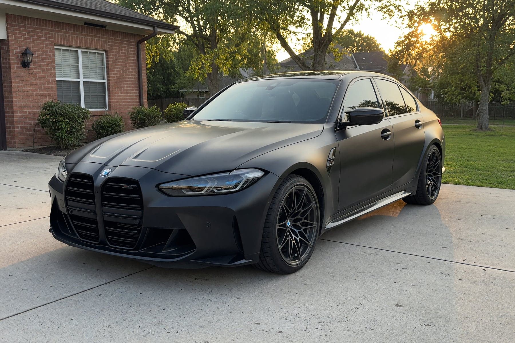 A customer’s own car photographed in their driveway.